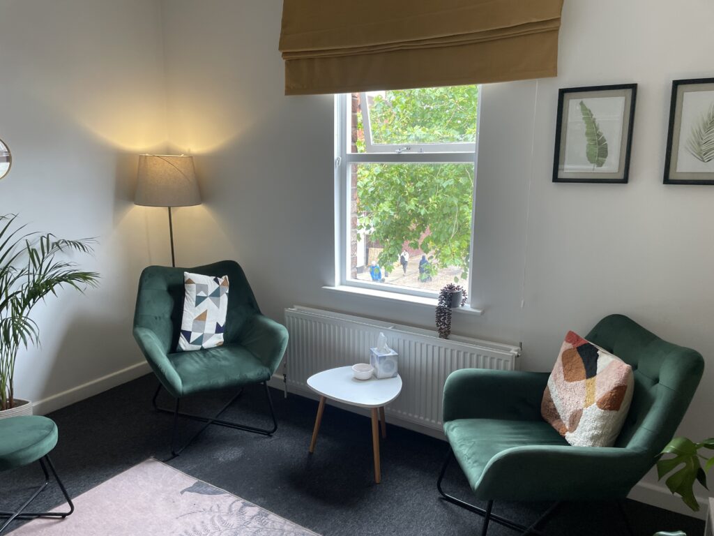 beyond barriers altrincham therapy room green chairs